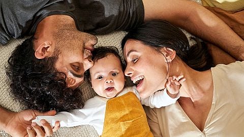 Male and female with baby