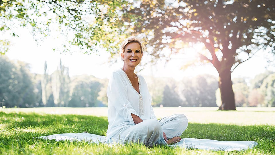 Smiling woman in nature